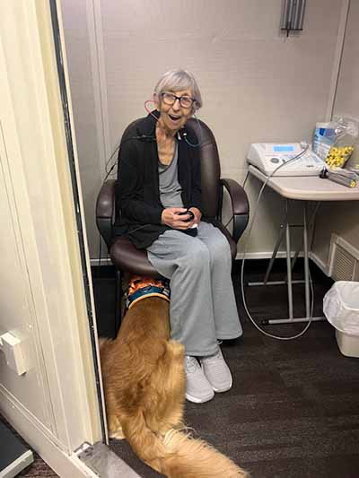 One Eldorado Audiology and Hearing Center patient with Phineas the dog.